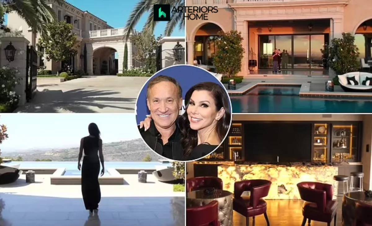 Heather Dubrow standing in the grand foyer of Chateau Dubrow, showcasing the mansion’s luxury interiors and sophisticated architectural design.