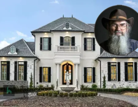 A glimpse into the cozy living room of Si Robertson House showcasing rustic decor reflecting his personality.