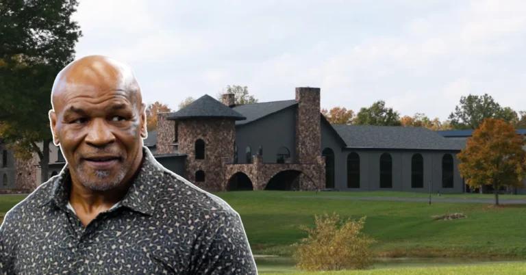 The grand entrance of the Mike Tyson House, featuring ornate gates, marble floors, and a sweeping staircase, reflecting the boxer's lavish lifestyle.