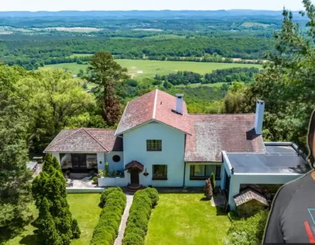 Bobby Lee house aerial view showing $1.5 million Los Angeles property with landscaped grounds and hillside location