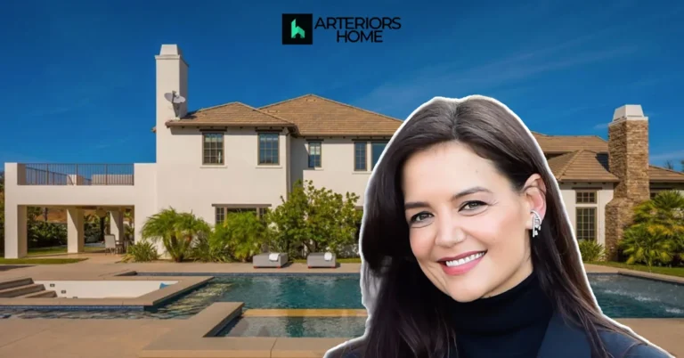 Katie Holmes House with a luxurious modern mansion, pool, and elegant outdoor living space under a bright blue sky.