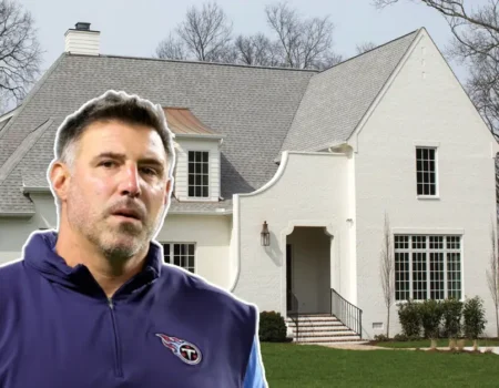 Front view of the Mike Vrabel House showcasing elegant architecture, lush landscaping, and the welcoming entrance of the NFL coach’s luxury home.