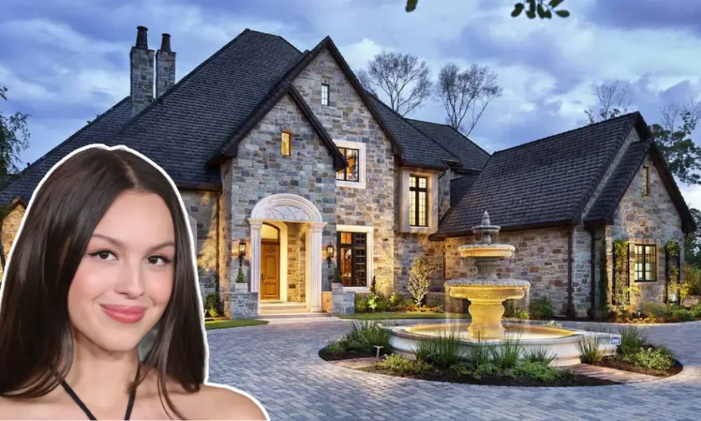 Front view of the Olivia Rodrigo House, showcasing modern architecture, lush gardens, and inviting outdoor spaces.