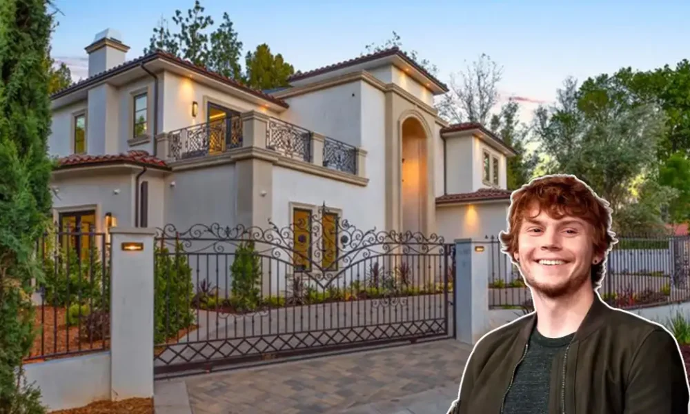 Front view of the Evan Peters House in Los Feliz, showing Mediterranean villa style, lush gardens, and luxury features.