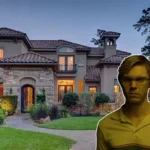 Jeffrey Dahmer House exterior with lush garden and historical significance