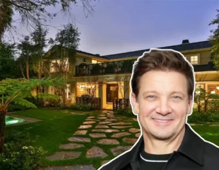 Front view of Jeremy Renner’s elegant house surrounded by lush landscaping, reflecting the actor Jeremy Renner’s sophisticated style and taste.