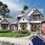 A stylish exterior shot of the Julian Edelman House, showcasing its colonial-modern design and lush Foxborough surroundings.