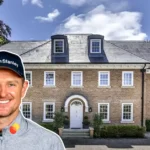 Justin Rose house: Golf star poses in front of his elegant brick London mansion featuring classic architecture and manicured landscapingRetryClaude can make mistakes. Please double-check responses.