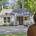 Karen Elliott House veteran journalist and Middle East expert standing beside modest house representing her small-town Texas roots