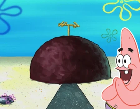 Patrick Star House—Patrick stands proudly in front of his iconic rock home in Bikini Bottom, as seen in SpongeBob SquarePants.