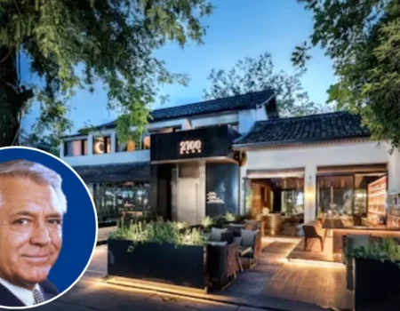 Historic Beverly Hills mansion once owned by Cary Grant, featuring a stately exterior, manicured landscaping, and classic 20th-century Hollywood architecture.