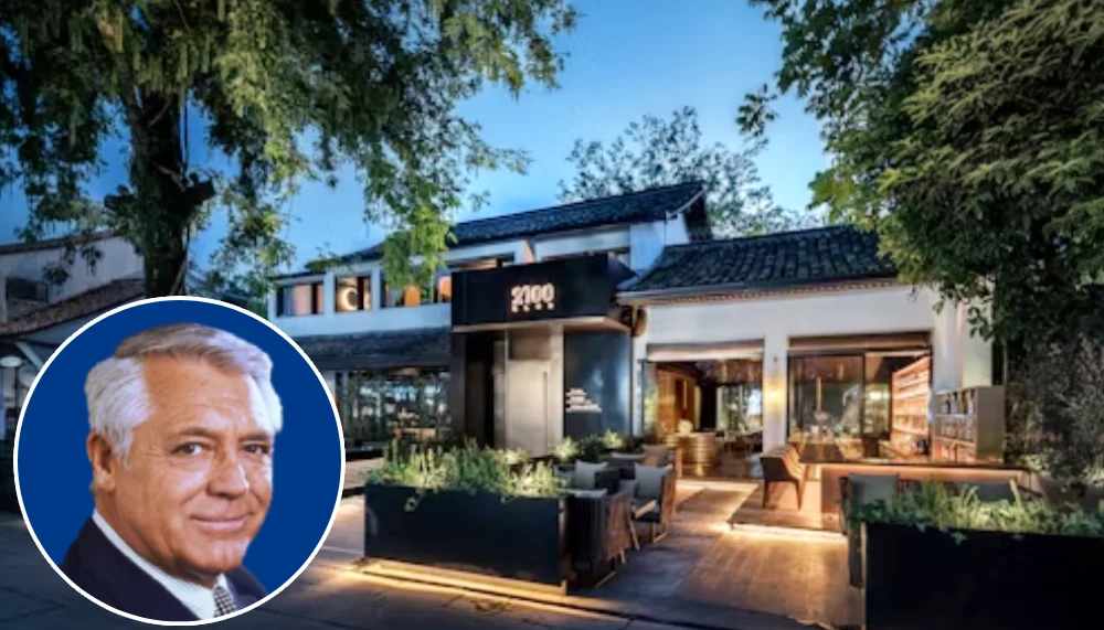 Historic Beverly Hills mansion once owned by Cary Grant, featuring a stately exterior, manicured landscaping, and classic 20th-century Hollywood architecture.