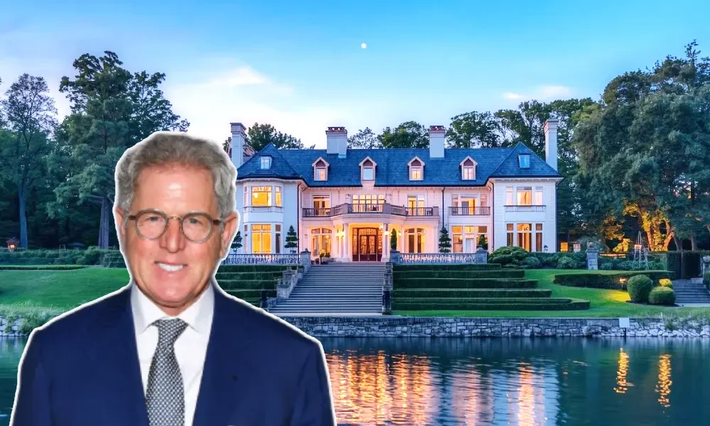 Aerial shot of Jay Schottenstein’s large luxury mansion with manicured gardens and a swimming pool.