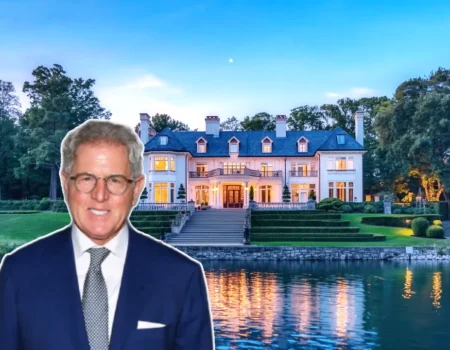 Aerial shot of Jay Schottenstein’s large luxury mansion with manicured gardens and a swimming pool.