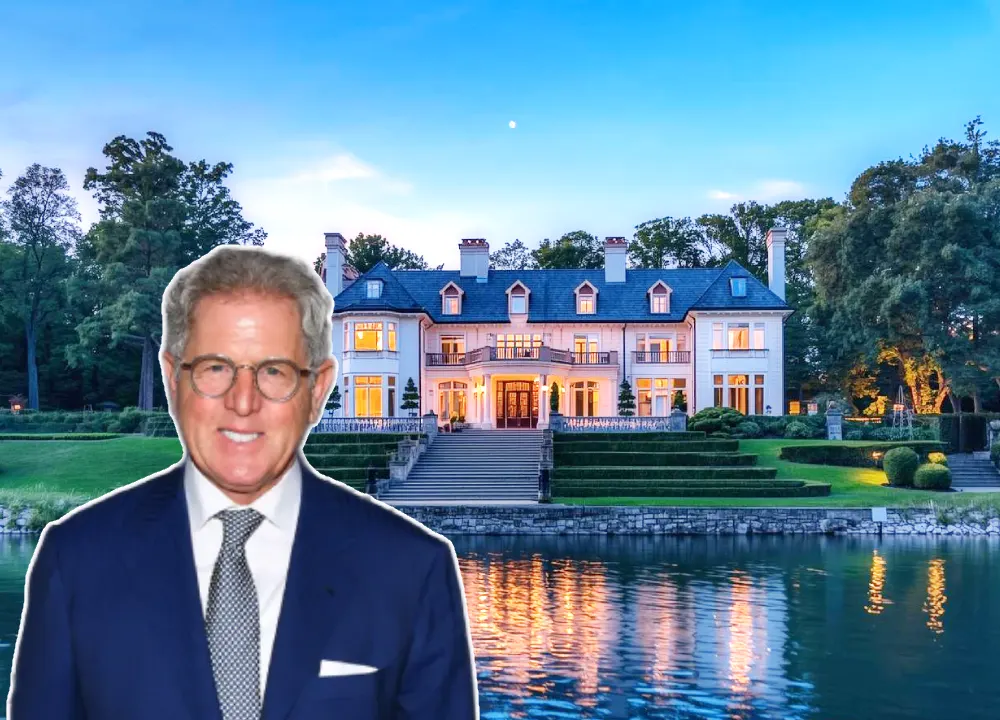 Aerial shot of Jay Schottenstein’s large luxury mansion with manicured gardens and a swimming pool.