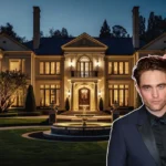 Robert Pattinson standing in front of a Spanish Colonial Revival home, symbolizing his Hollywood Hills real estate portfolio.