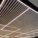 Modern metal ceiling panels with smooth silver finish