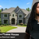 The modern gray and stone exterior of the Waka Flocka Flame House in Georgia.