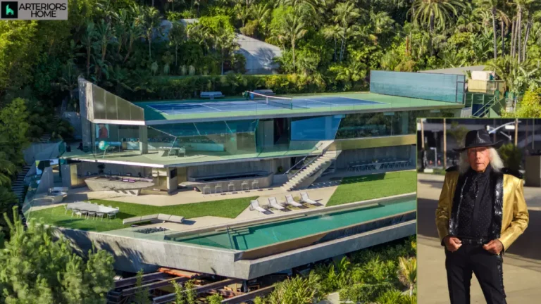 Jimmy Goldstein House exterior with glass walls and hillside views